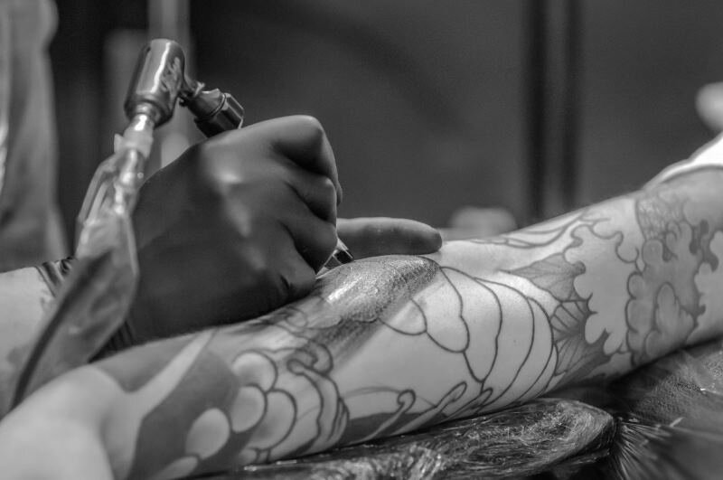 Was it really a one night stand with a tattoo artist - was he really just too busy to call? Guy Giving Tattoo Too Busy Text Call