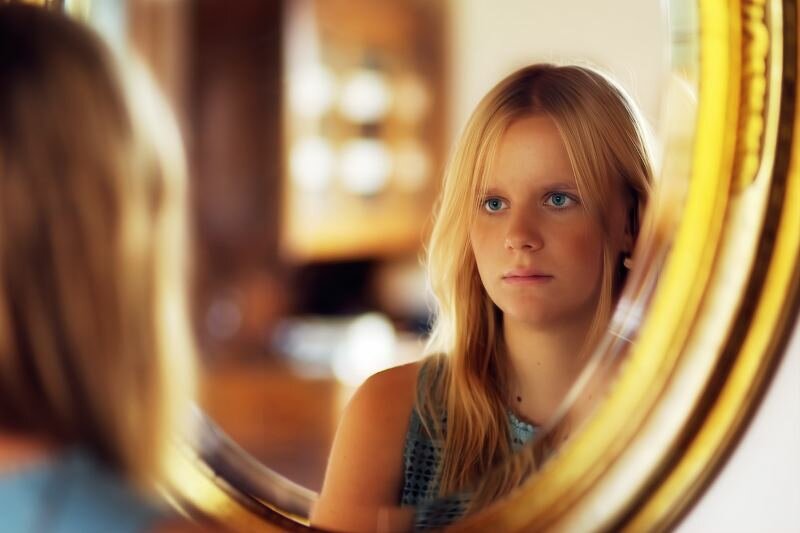 Woman Looking For Herself Mirror