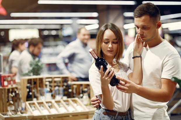 Man Woman Buying Wine Dinner